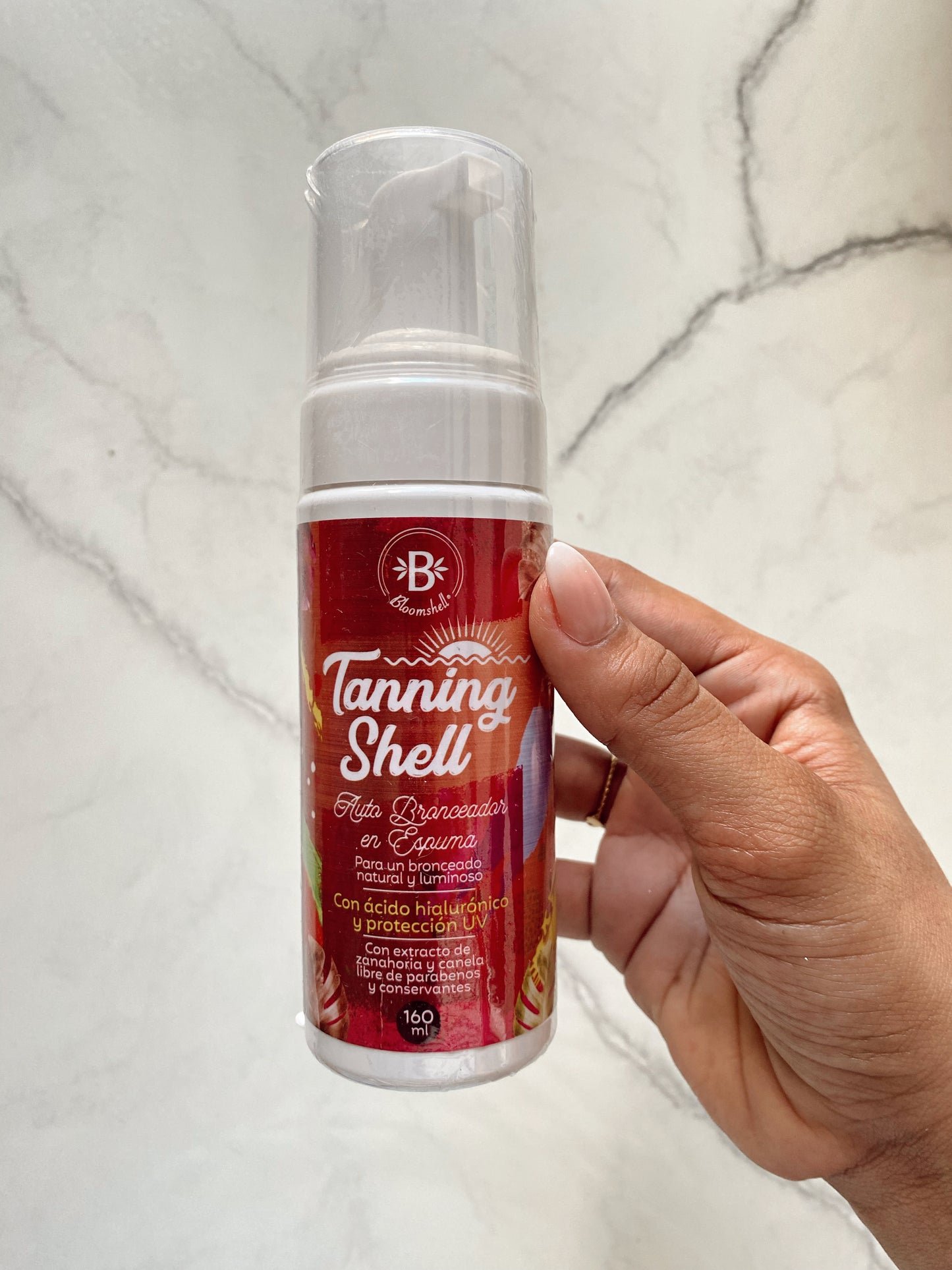Auto bronceador bloomshell