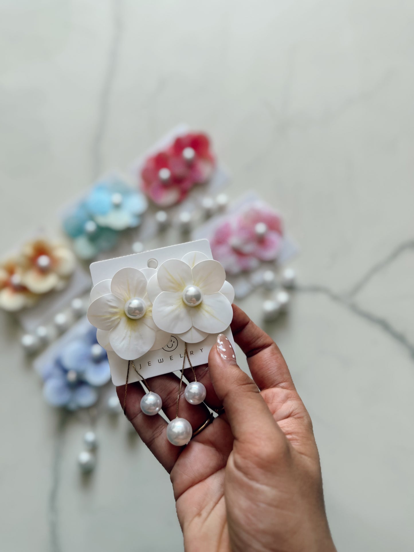 Aretes perla flor ✨